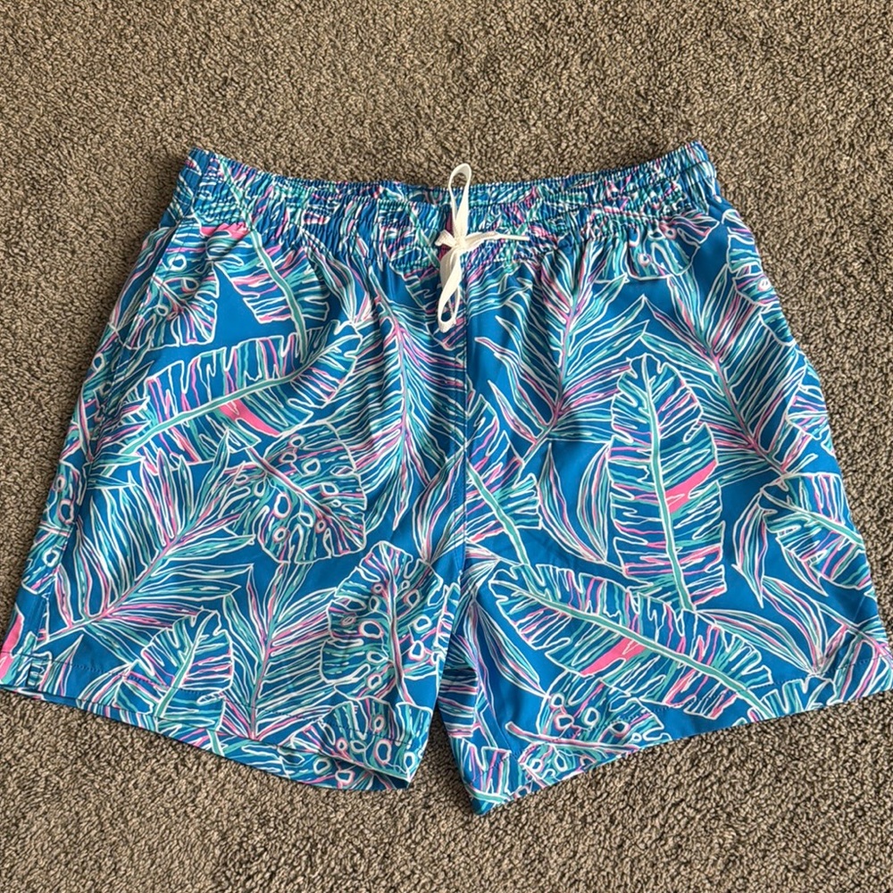 Chubbies Blue and Pink Swim Trunks Vibrant Leaf Design